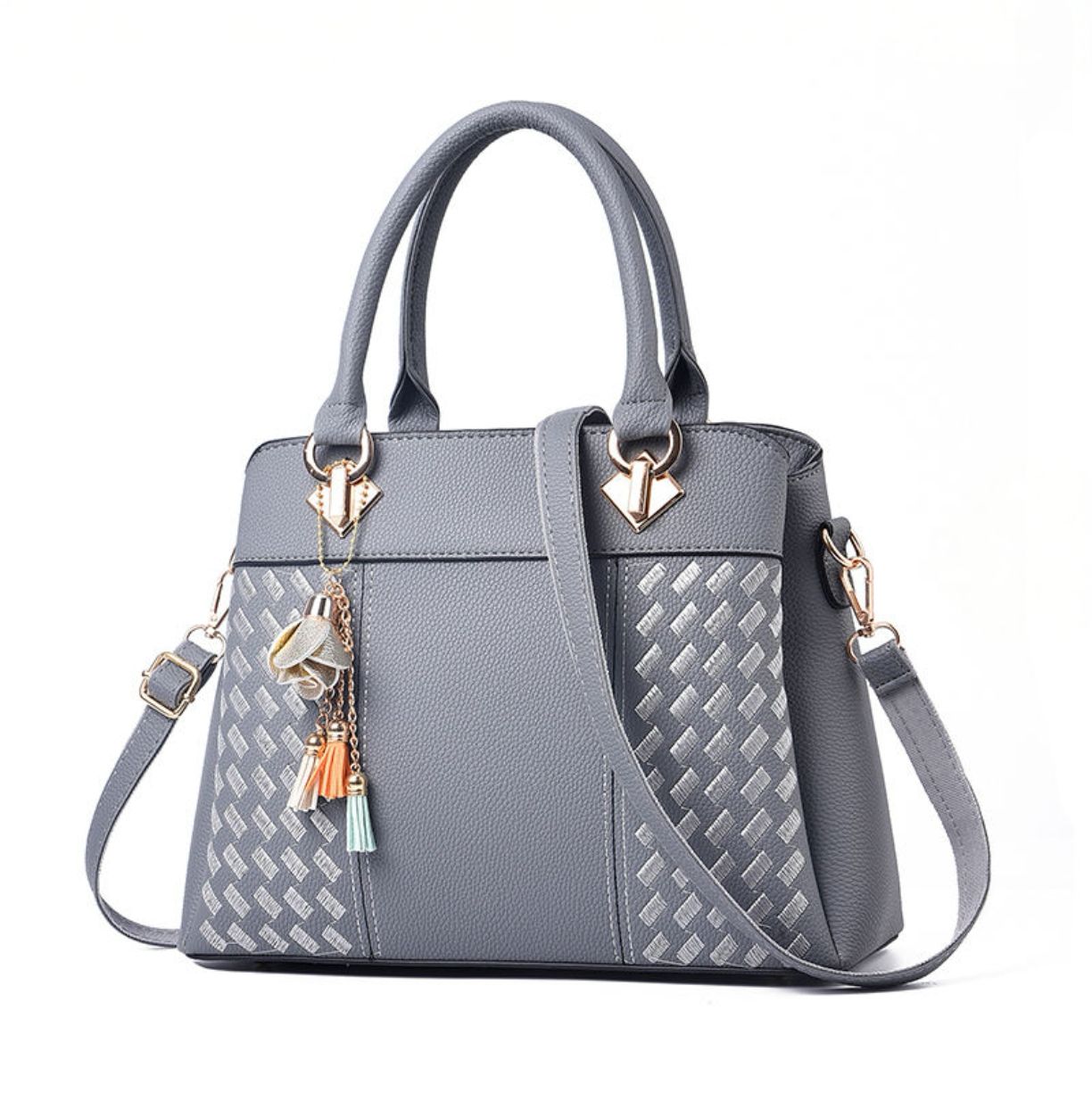 Gray handbag with decorative charms on a white background